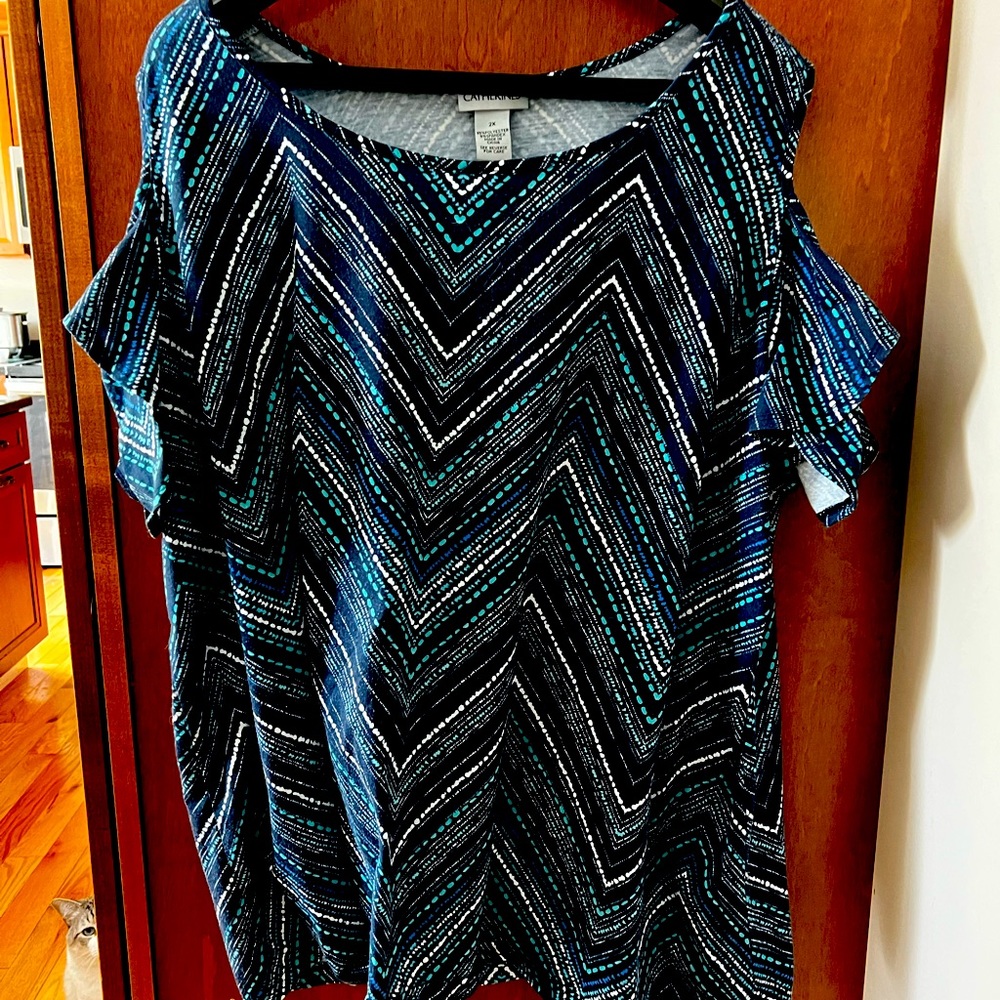 Catherine’s top in like new condition.
